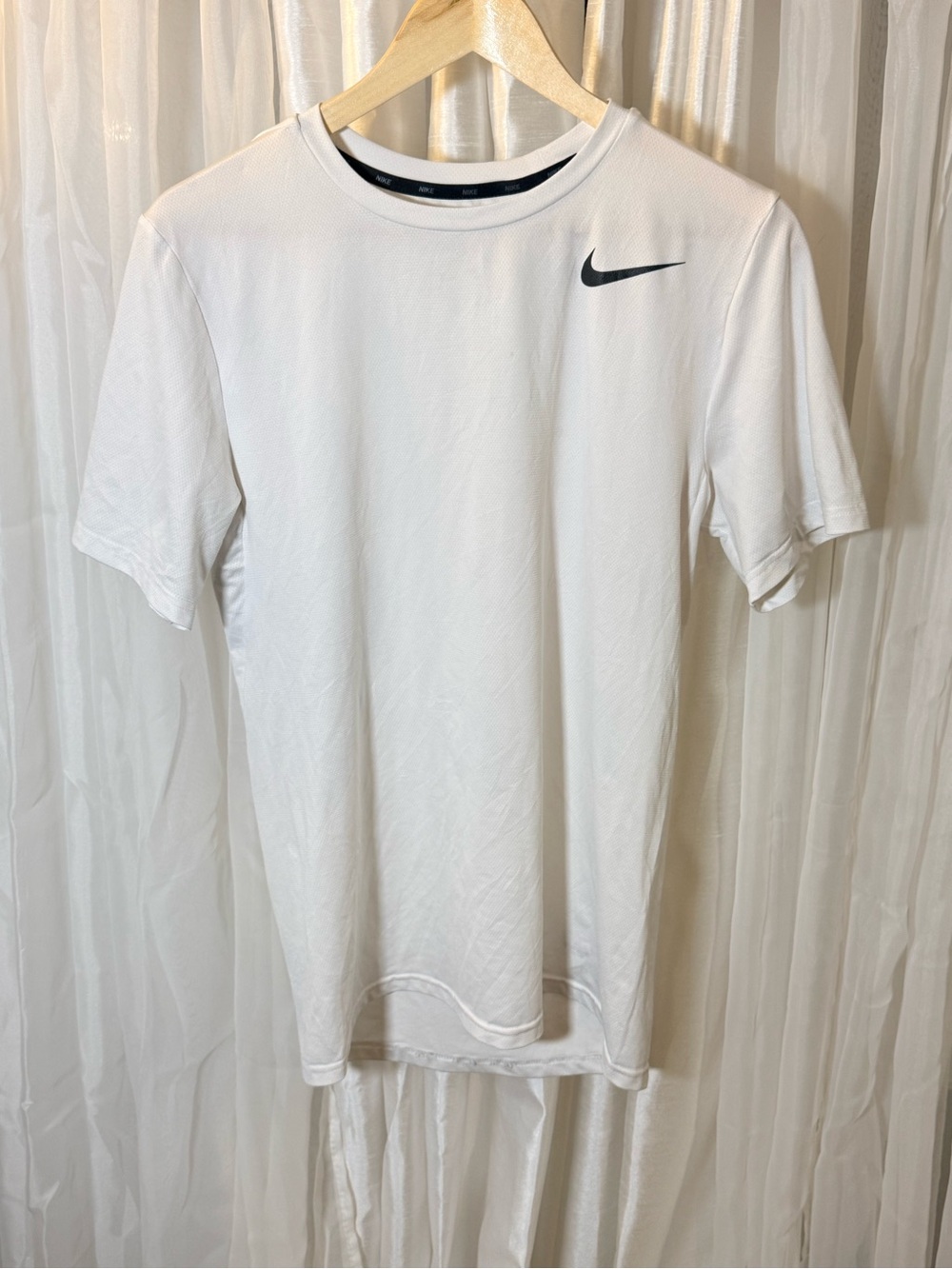 Nike White Short Sleeve Dri-FIT Tee with Black Swoosh
